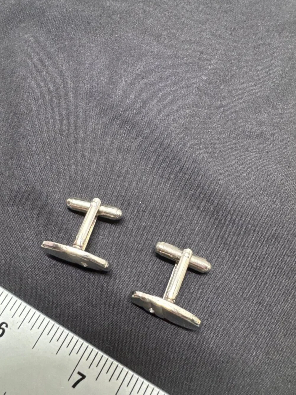 Silver Oval Cufflinks With Textured Back & Single Diamond Accent For Men